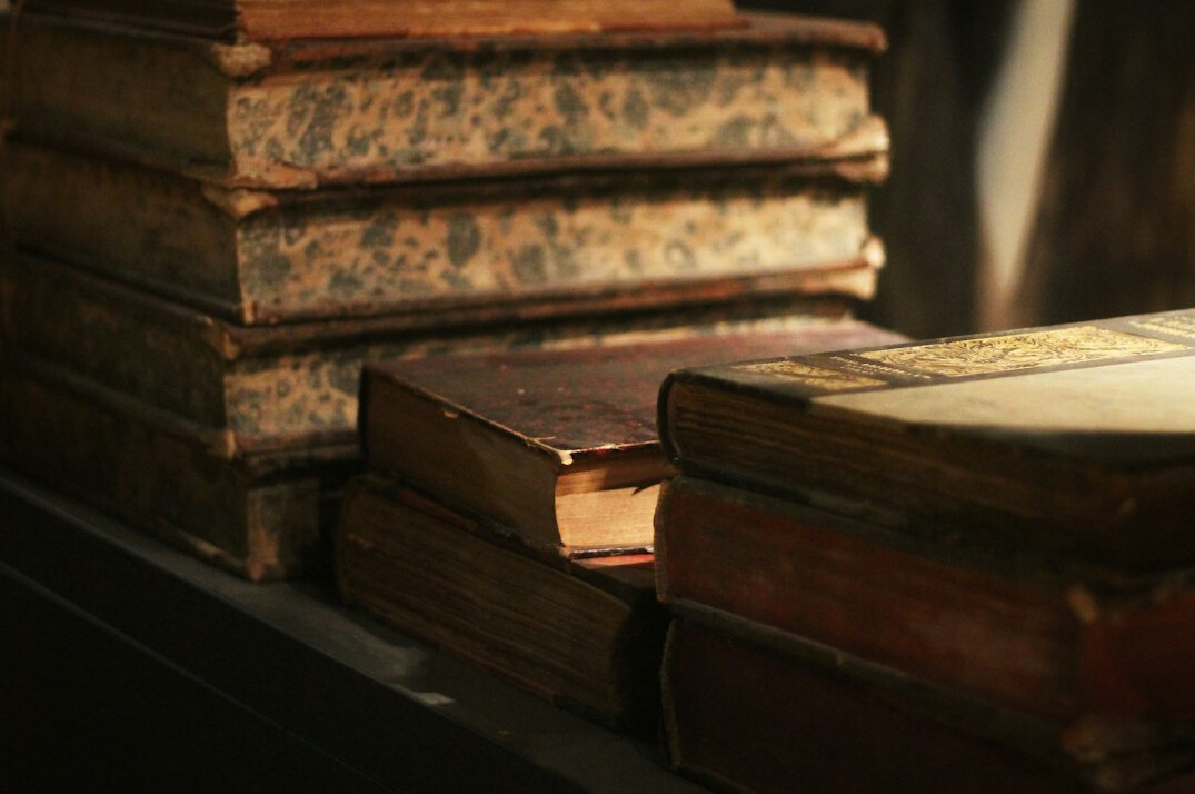 stack of old leather bound books
