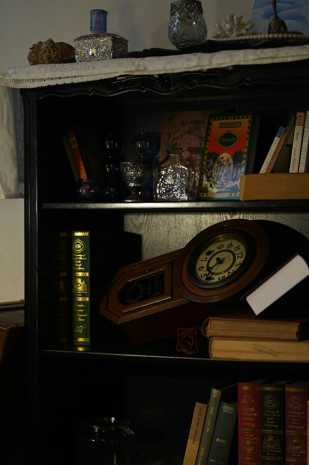 old rare books on wooden shelf